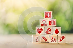 Lay out wooden blocks with icons of medical health. health insurance for your health concept. Healthcare medical business