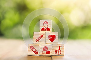 Lay out wooden blocks with icons of medical health. health insurance for your health concept. Healthcare medical business, medical
