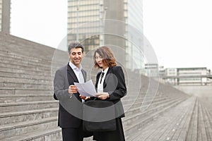 male lawyer speaking with female client. photo