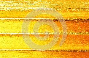 Layer of gold horizontal lines pattern texture abstract background
