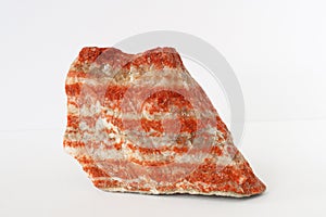 Layered cake of sylvinite mineral also potash or or potassium chloride with sodium chloride on white background photo