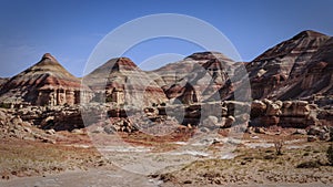 Layered hills of the Morrison Formation along Cathedral Road