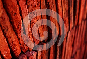 Layers of red terracotta tiles closeup photo