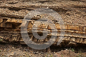 Layers of sedimentary rock outcrops photo