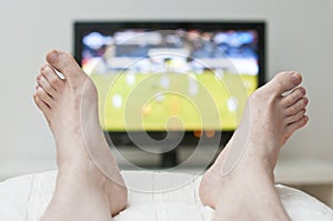 Laying in bed and watching tv