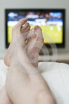 Laying in bed and watching tv