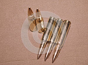 The laying cartriges 308 Winchester caliber with full metal jacket bullets steel case