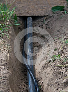 Laying of communications, supply of water and electricity to buildings under the ground, an uncovered trench