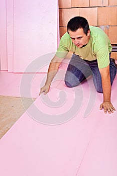 Laying floor insulation in a new house