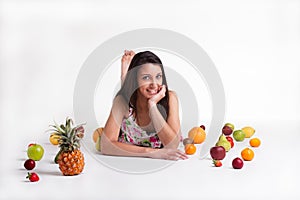 Laying between the fruits