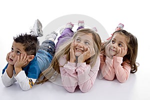 Laying kids looking upward