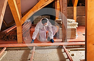 Laying thermal insulation - installing the planking photo