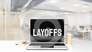 The Layoffs word on notebook for Business concept 3d rendering photo