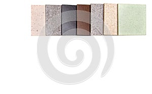 Layout of artificial stone samples on a white background. A variety of texture samples for kitchen countertops. Materials for