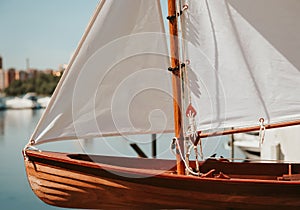 Layout of wooden boat. Old wooden sailboat pulleys and ropes detail