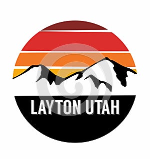 Layton Utah with a sunset sky and mountain silhouettes photo