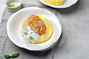 Lazy cabbage rolls with mashed potatoes and sour cream