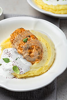 Lazy cabbage rolls with mashed potatoes and sour cream