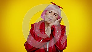 Lazy elderly woman yawning, sleepy inattentive feeling somnolent bored, suffering from lack of sleep