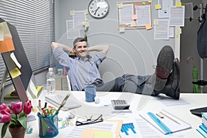 Lazy office worker feet up