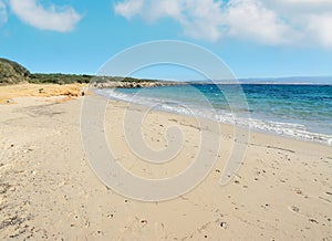 Lazzaretto beach under a cloudy sky