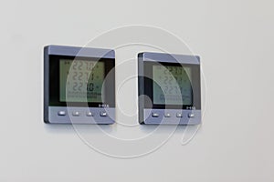 LCD digital AC voltmeters on a control panel