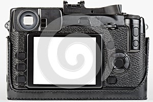 LCD view of well used, retro style digital camera
