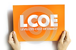 LCOE - Levelized Cost Of Energy acronym on card, abbreviation concept background