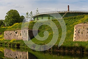 ld fortification wall combined with an industrial touch of a former gass holder gashouder building in Maastricht