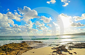 Le Bombarde beach under a cloudy sky