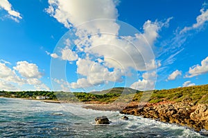 Le bombarde beach under a cloudy sky