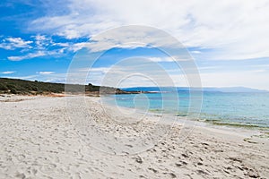 Le Bombarde beach under a cloudy sky