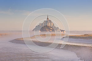 Le Mont Saint Michel in Normandy, France at sunrise