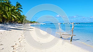 Le Morne beach Mauritius Tropical beach with palm trees and white sand blue ocean