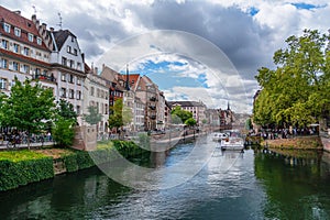 Le Petite France, the most picturesque district of old Strasbourg. Houses with reflection in waters of the Ill channels photo