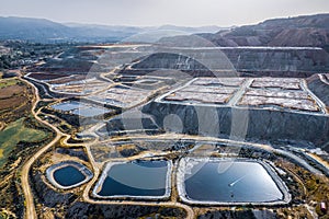 Leaching heaps and storage reservoirs at copper ore processing plant. Skouriotissa, Cyprus