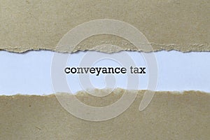Conveyance tax word on white paper photo