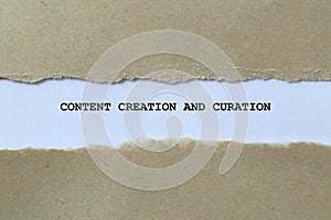 content creation and curation on white paper photo