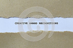 creative award recognitions on white paper