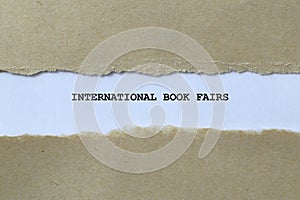 international book fairs on white paper photo