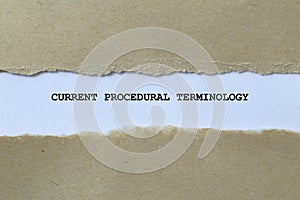 current procedural terminology on white paper photo