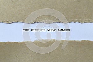 the sleeper must awaken on white paper photo