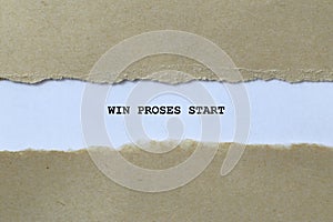 win proses start on white paper photo