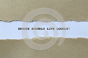 snooze soundly live loudly on white paper photo