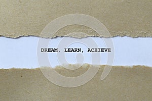 dream learn achieve on white paper