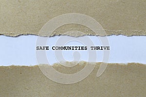 safe communities thrive on white paper photo