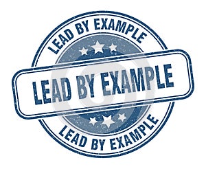 lead by example stamp. lead by example round grunge sign.