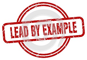 lead by example stamp. lead by example round grunge sign.