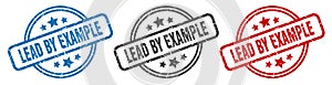 lead by example stamp. lead by example round isolated sign.