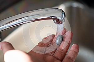 Lead metal contamination in tap water photo